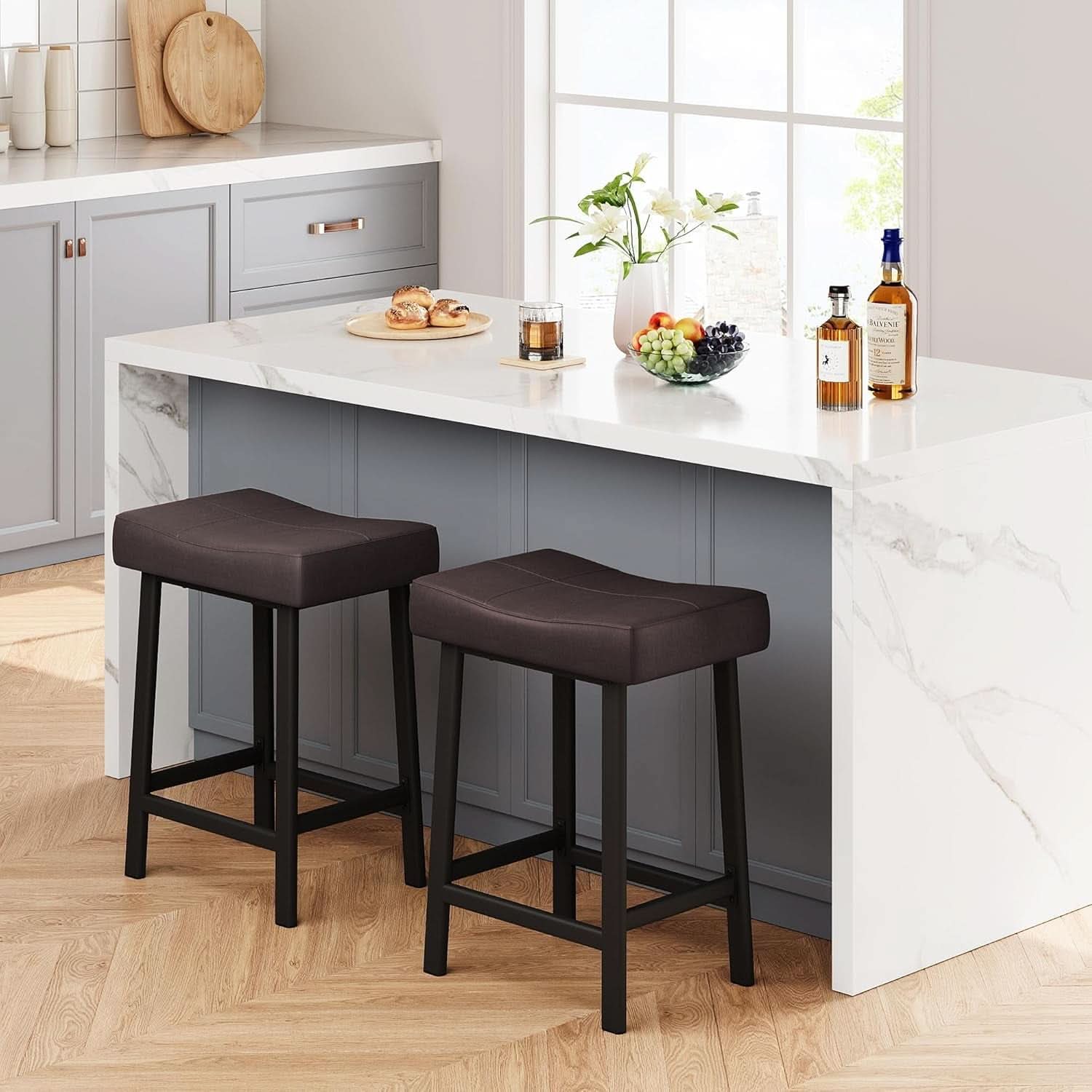 24 Inch Backless Saddle Bar Stools Two Pack, Counter Height Upholstered Padded Seats With Curved Surface, Brown