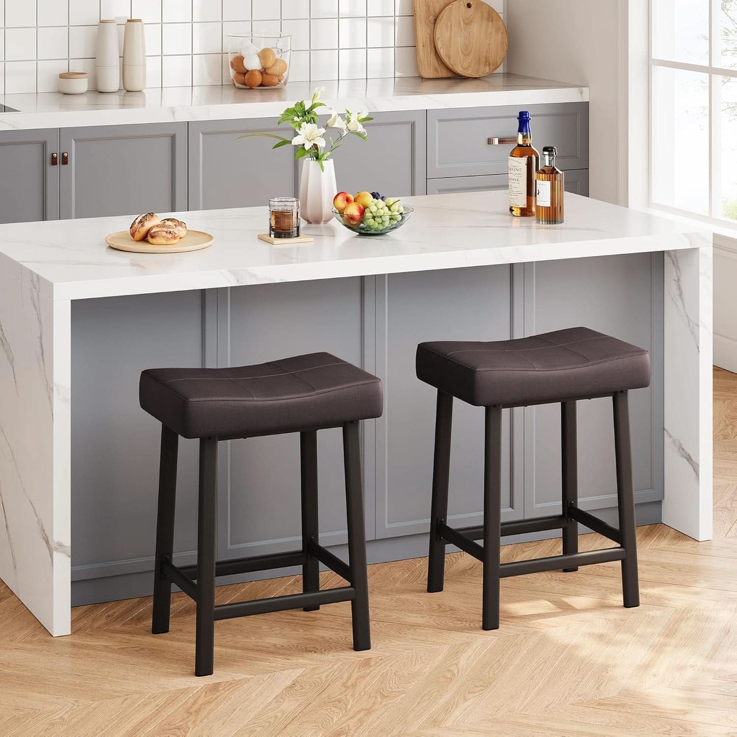 24 Inch Backless Saddle Bar Stools Two Pack, Counter Height Upholstered Padded Seats With Curved Surface, Brown