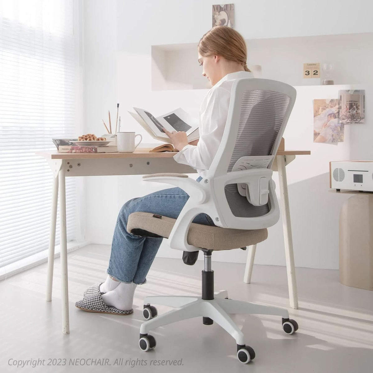 Beige High Back Mesh Office Chair With Adjustable Height And Ergonomic Design