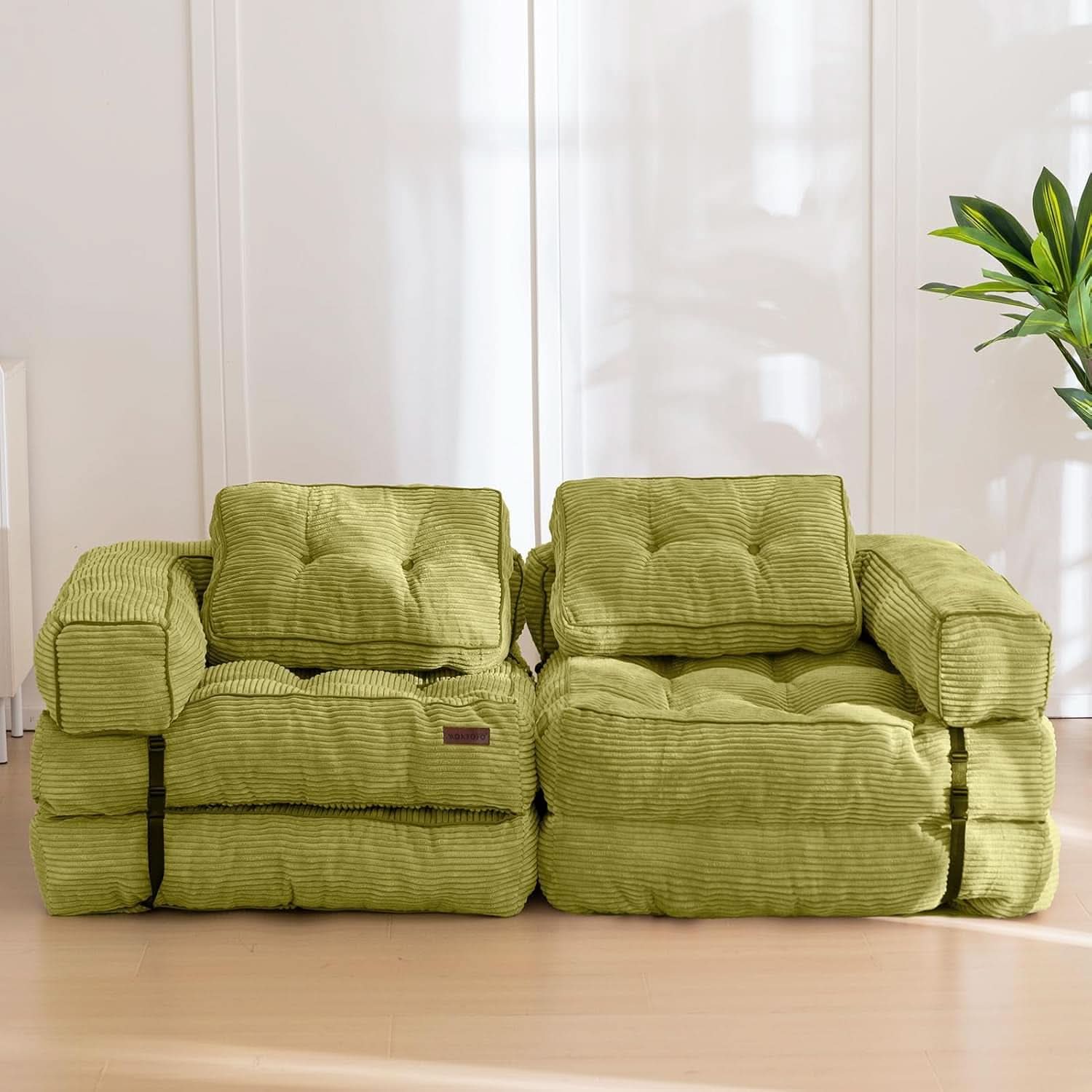 Green L Shaped Convertible Sofa Bed With Armrest And Pillow