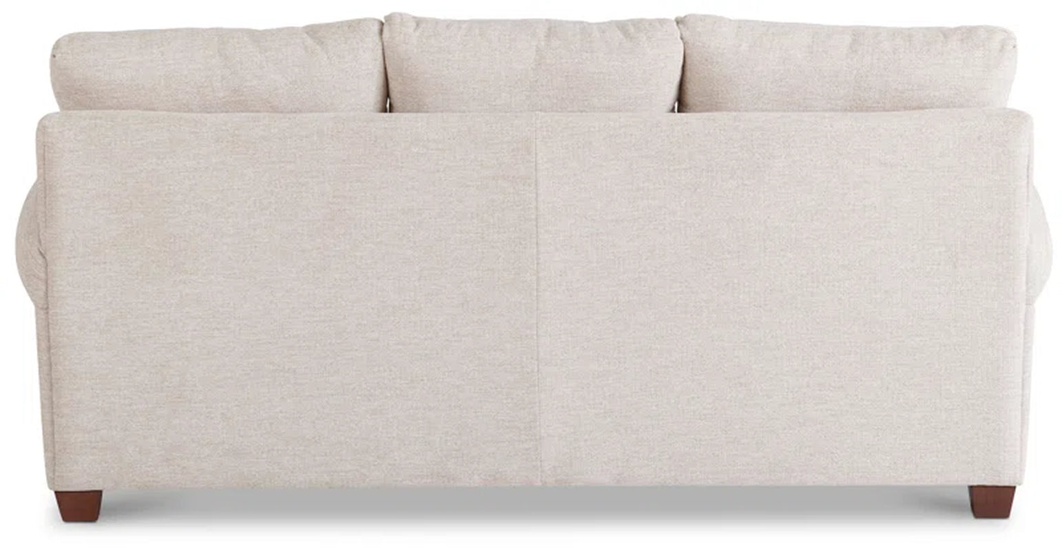 Mid Sized Transitional Sofa With Flared Arms Durable Frame