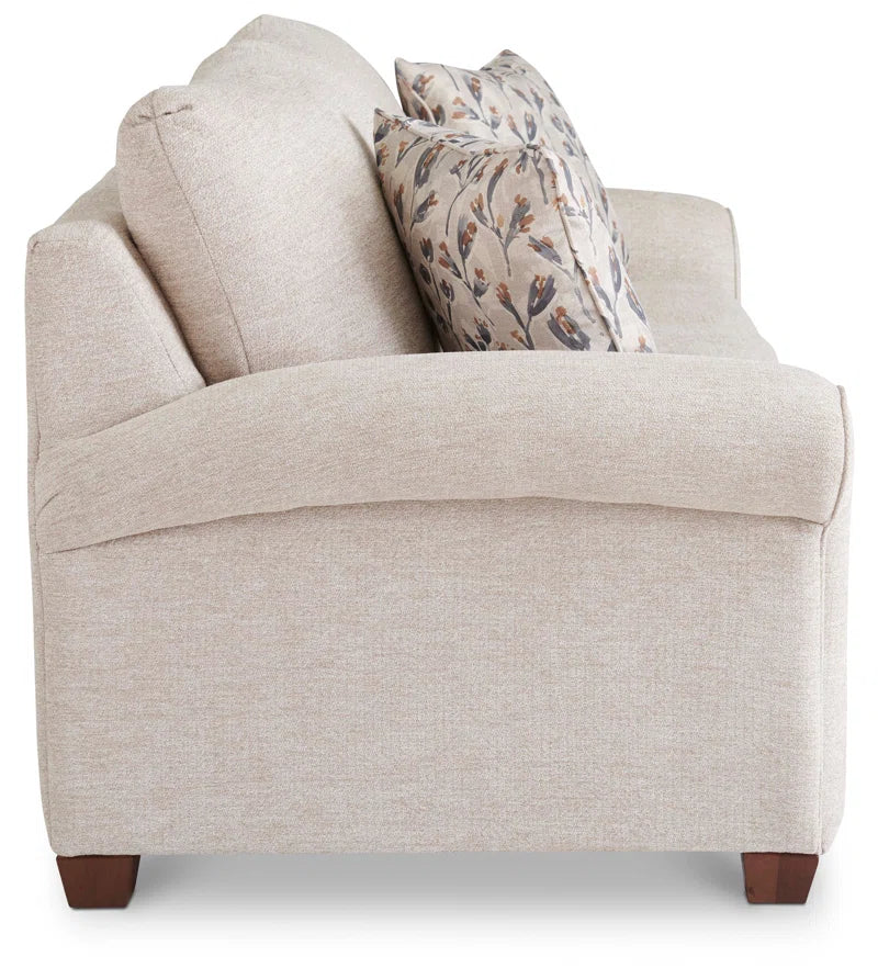 Mid Sized Transitional Sofa With Flared Arms Durable Frame