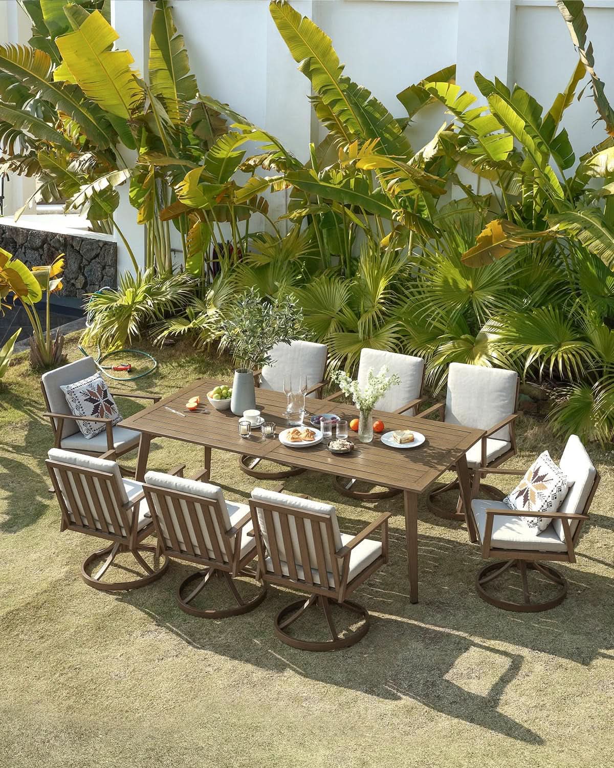 Nine Piece Outdoor Patio Dining Set with Swivel Chairs