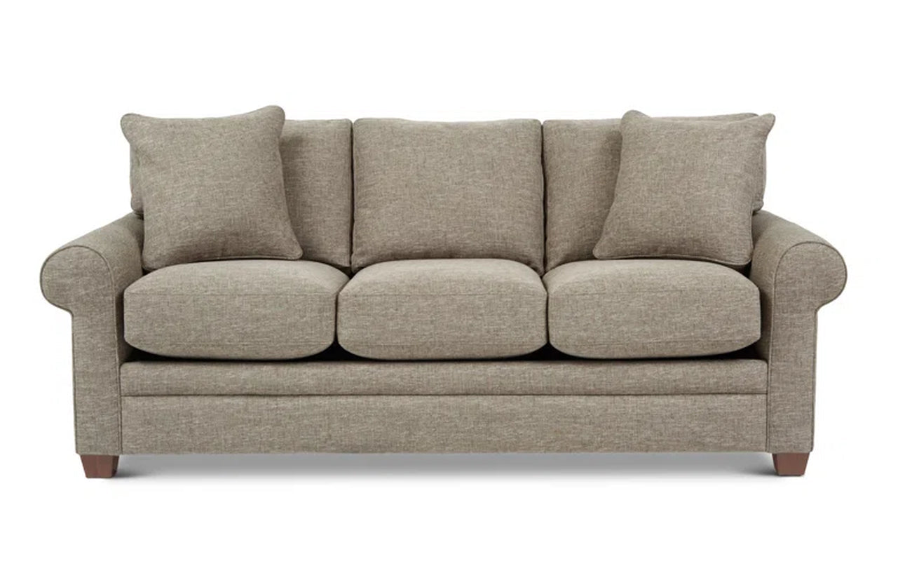 Olson Upholstered Sofa With Rolled Arms And Wood Legs
