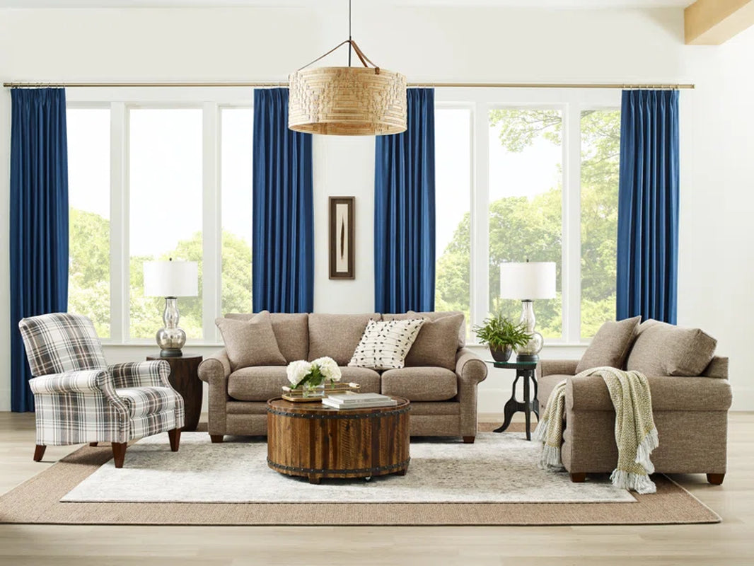 Olson Upholstered Sofa With Rolled Arms And Wood Legs