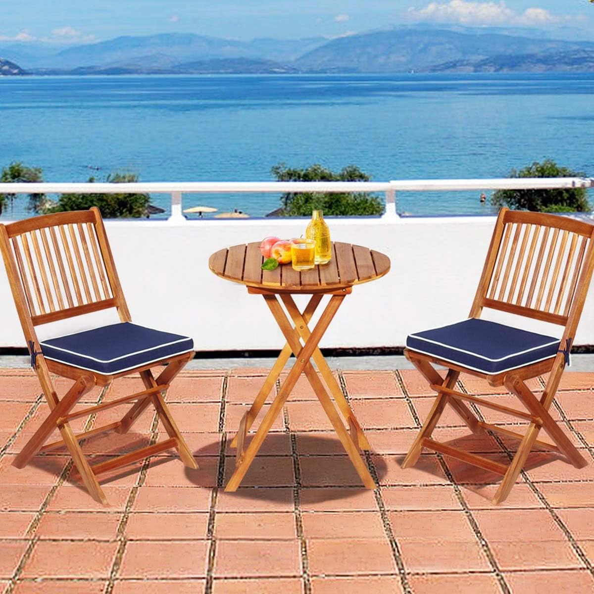 Patio Bistro Set With Wood Table And Navy Cushioned Chairs