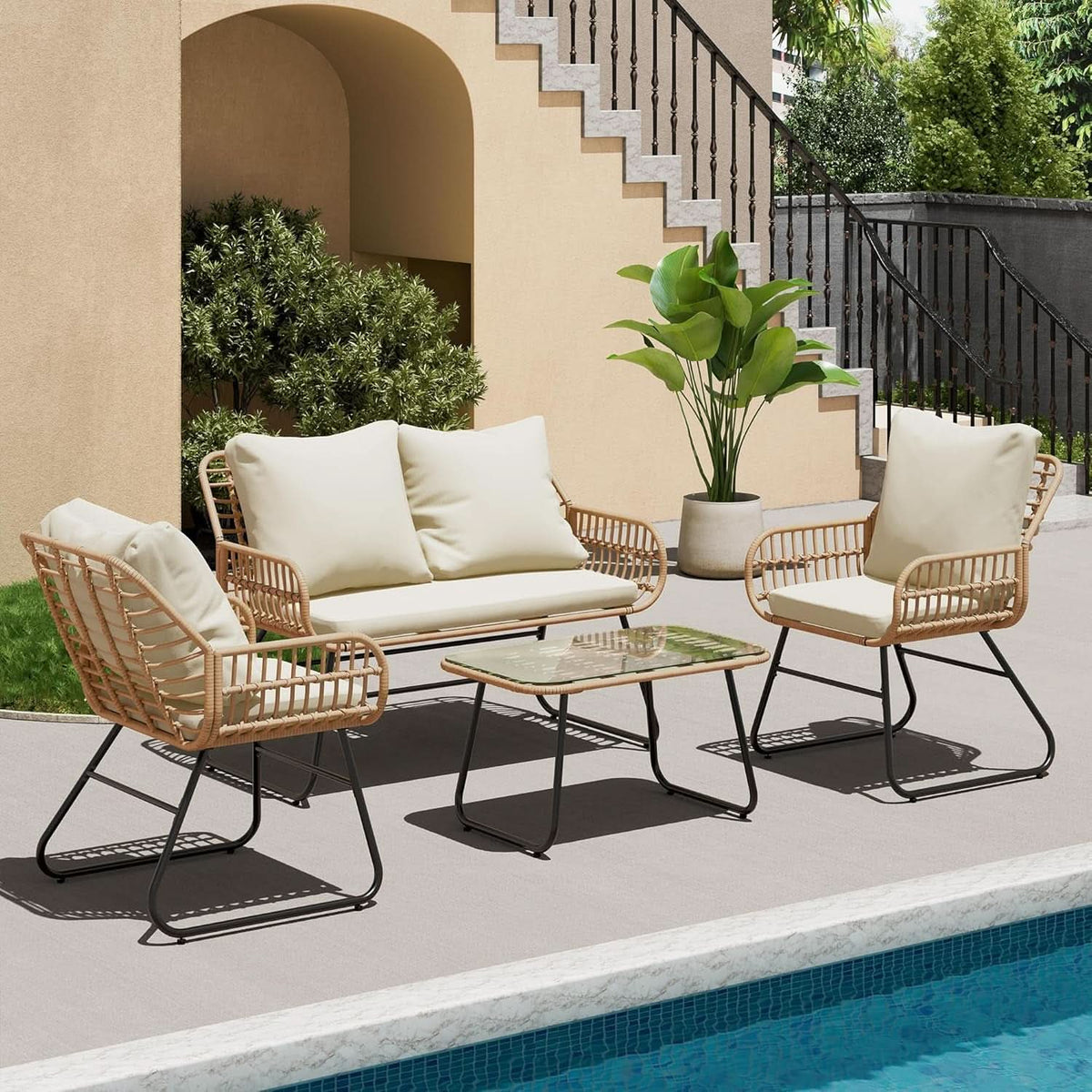 Stylish Four-Piece Outdoor Rattan Furniture Set with Cushions