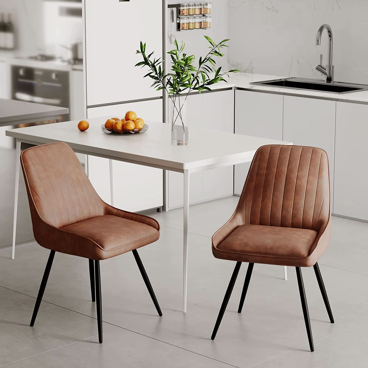 Two Brown Faux Leather Mid Century Modern Dining Chairs